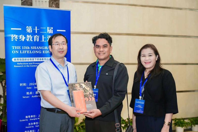 รองศาสตราจารย์ ดร. นิรัช สุดสังข์ และรองศาสตราจารย์ ดร.วิติยา ปิดตังนาโพธิ์ เข้าร่วมการประชุมวิชาการ The 12th Shanghai Forum on Lifelong